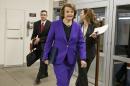 Senate Intelligence Committee Chair Sen. Dianne Feinstein, D-Calif. arrives to release a report on the CIA's harsh interrogation techniques at secret overseas facilities after the 9/11 terror attacks, Tuesday, Dec. 9, 2014, on Capitol Hill in Washington. (AP Photo/J. Scott Applewhite)