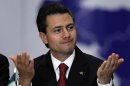 Mexico's President Nieto gestures during the Central American Integration System summit in San Jose