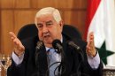 Syria's FM Moualem speaks during a news conference in Damascus