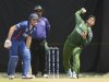 Pakistan's Ajmal bowls as England's Wright looks on during a warm-up match at the P. Sara oval in Colombo
