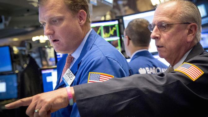 Dow falls 100 points as China weighs; Fed in focus