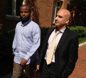 FILE - In this Aug. 16, 2013, file photo, Gulet Mohamed, left, leaves the federal court in Alexandria, Va., with his attorney, Gadeir Abbas, with the Council on American-Islamic Relations, after a hearing challenging his placement on the government&#39;s no fly list. The FBI on Jan. 29, 2015, added Liban Haji Mohamed, a former taxi driver from northern Virginia to its list of most wanted terrorists, saying he was a recruiter for the al-Shabab terror group in Somalia. An arrest warrant, originally issued in February, was unsealed in U.S. District Court in Alexandria for Liban Haji Mohamed, 29, a naturalized U.S. citizen born in Somalia. The family denies that Mohamed committed any wrongdoing and suspects he went into hiding to avoid constant harassment from the FBI. &quot;Al-Shabab has killed Liban’s uncle and imprisoned his cousins,&quot; said Abbas, who for years has represented Mohamed’s brother in a civil-rights suit against the government. &quot;His family believes the allegations have no basis in fact.&quot; (AP Photo/Matthew Barakat, File)