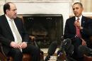 U.S. President Obama and Iraq's PM Maliki talk to reporters in the Oval Office after meeting at the White House in Washington
