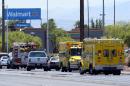 Police and fire vehicles line the street outside a Wal-Mart on June 8, 2014 in Las Vegas, Nevada
