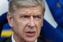 Arsenal's French manager Arsene Wenger awaits kick off of the English Premier League football match between Crystal Palace and Arsenal at Selhurst Park in south London on October 26, 2013