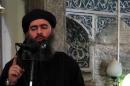 This image from a video released on July 5, 2014 by al-Furqan Media is said to show Abu Bakr al-Baghdadi addressing Muslim worshippers at a mosque in Mosul