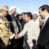 In this image provided by the Presidency Office, Iranian President Mahmoud Ahmadinejad, second right, shakes hand with an unidentified army colonel as he arrives at the Shahr-e-Kord, during his provincial tour, in central Iran, Wednesday, Nov. 9, 2011. Iran won't retreat "one iota" from its nuclear program but the world is being misled by claims that it seeks atomic weapons, President Mahmoud Ahmadinejad said Wednesday in his first reaction since a U.N. watchdog report that Tehran is on the brink of developing a warhead. (AP Photo/Presidency Office, Ebrahim Seyyedi, HO) EDITORIAL USE ONLY, NO SALES