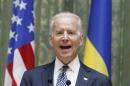 U.S. Vice President Joe Biden speaks during a media briefing after a meeting with Ukraine's Prime Minister Arseny Yatseniuk in Kiev