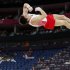 Scores of empty seats can be seen as Russia's gymnast Igor Parkhomenko competes during the London Olympics on July 28