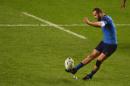France's fly half Frederic Michalak kicks the ball during a Pool D match of the 2015 Rugby World Cup against Canada at Stadium mk in Milton Keynes, north of London, on October 1, 2015