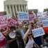Supporters of President Barack Obama's health care law celebrate outside the Supreme Court in Washington, Thursday, June 28, 2012, after the court's ruling. AP Photo/David Goldman)