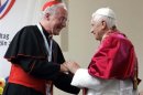 File photo of Pope Benedict XVI greeting Cardinal Marc Ouellet