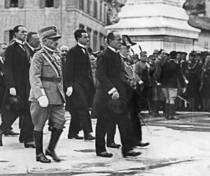 Benito Mussolini (R-foreground), surrounded by members&nbsp;&hellip;