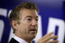 Sen. Rand Paul, R-Ky. speaks during a stop with local Republicans, Tuesday, Aug. 5, 2014, in Hiawatha, Iowa. (AP Photo/Charlie Neibergall)
