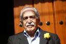 File photo of Garcia Marquez standing outside his house on his 87th birthday in Mexico City