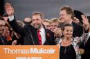Thomas Mulcair waves during the New Democratic Party leadership convention in Toronto, Ontario on March 24, 2012
