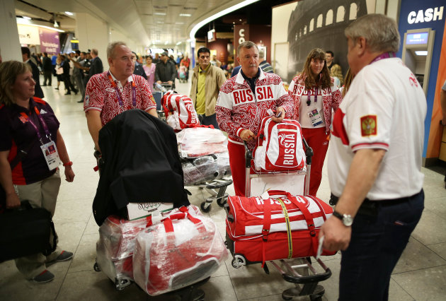 athletes-arrive-heathrow-around-world-20120716-063618-128.jpg