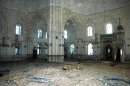 This Saturday, July 27, 2013 photo released by the Syrian official news agency SANA, shows the inside of the Khalid Ibn al-Walid Mosque in the heavily disputed northern neighborhood of Khaldiyeh, in Homs, Syria. Syrian government forces captured a historic mosque in the central city of Homs on Saturday, expelling rebel forces who had been in control of the 13th century landmark for more than a year and dealing a symbolic blow to opposition forces. (AP Photo/SANA)