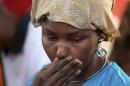 File photo shows a protester criying during a sit-in rally for the abducted schoolgirls, at the Unity Fountain in Abuja