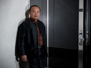 Cambodian director Rithy Panh poses for a photo in Cannes, during the 63rd Cannes Film Festival, on May 13, 2010