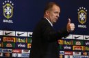 Brazilian national soccer team head coach Menezes gestures after a news conference in Rio de Janeiro