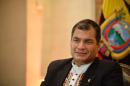 Ecuador President Rafael Correa poses during an interview in an hotel on November 7, 2013 in Paris