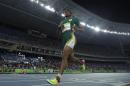 The Latest: South Africa's Semenya easily wins women's 800m