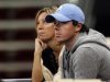 Golfer McIlroy watches from the stands the WTA Tournament of Champions final match between Wozniacki of Denmark and Petrova of Russia in Sofia