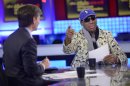 In this Sunday March 3, 2013, photo provided by ABC television "This Week" host George Stephanopoulos, left, interviews former NBA star Dennis Rodman, just back from a visit with North Korea's young leader Kim Jong Un, in studio in New York. Kim Jong Un doesn't really want war with the superpower, just a call from President Barack Obama to chat about their shared love of basketball, says erstwhile diplomat Rodman."He loves basketball. ... I said Obama loves basketball. Let's start there" as a way to warm up relations between U.S. and North Korea", Rodman said. (AP Photo/ABC Television, Lorenzo Bevilacqua)