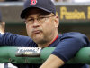 FILE - In this June 25, 2011, file photo, Boston Red Sox manager Terry Francona stands in the dugout during a 6-4 loss to the Pittsburgh Pirates in an interleague baseball game in Pittsburgh. A person familiar with the decision says the Cleveland Indians on Saturday, Oct. 6, 2012, have chosen Francona to be their next manager and are working with him on a contract. (AP Photo/Gene J. Puskar, File)
