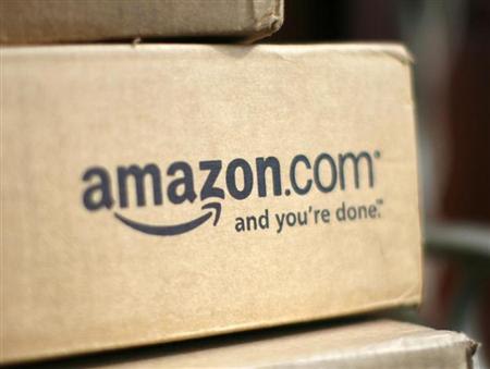 A box from Amazon.com is pictured on the porch of a house in Golden, Colorado July 23, 2008. Online retailer Amazon.com Inc said on Wednesday its quarterly profit doubled on a 41 percent rise in revenue, sending its shares up more than 6 percent. REUTERS/Rick Wilking