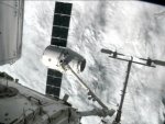 SpaceX Dragon capsule arrives at space station