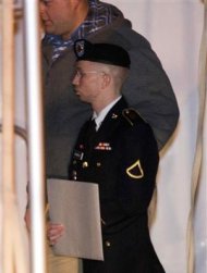 U.S. Army Private First Class Bradley Manning (front) leaves the courthouse after his motion hearing in Fort Meade, Maryland February 28, 2013. REUTERS/Jose Luis Magana