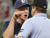 Milwaukee Brewers manager Ron Roenicke, left, argues with first base umpire Sam Holbrook before being ejected in the first inning of a baseball game against the Houston Astros on Saturday, July 7, 2012, in Houston. (AP Photo/Pat Sullivan)