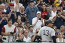 Fans react as New York Yankees' Alex Rodriguez (13) walks to the dugout after lining out during the second inning of a baseball game against the Boston Red Sox in Boston, Thursday, Aug. 11, 2016. (AP Photo/Michael Dwyer)