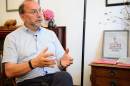 Peter Piot, the Belgian scientist who co-discovered the Ebola virus in 1976, speaks during an interview at his office in London, England, on July 30, 2014