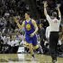 Golden State Warriors guard Klay Thompson reacts after hitting a three-point shot against the San Antonio Spurs during their NBA basketball game in San Antonio, Texas