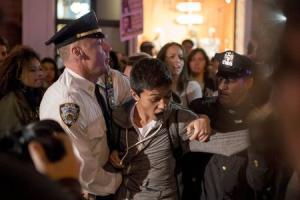 Protester is detained by New York City police officers&nbsp;&hellip;
