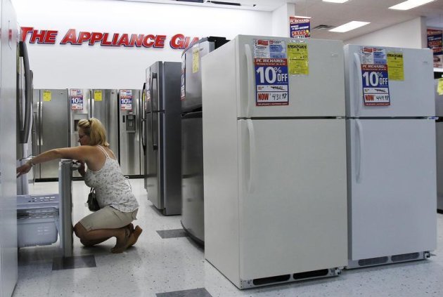 A woman shops for refrigerators at a store in New York July 28, 2010. REUTERS/Shannon Stapleton