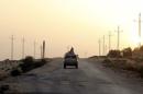 File photo of an Egyptian military vehicle on the highway in northern Sinai