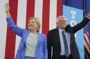 After Clinton Embraces Sanders' Costly Spending, He Endorses Her