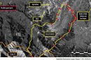 Satellite image shows what Amnesty International calls 20 possible guard posts in North Korea's Ch'oma-Bong valley