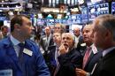 Futures start quarter on a quiet note ahead of data