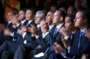 U.S. President Barack Obama, center, and other world leaders applaud as they watch a cultural performance of indigenous dancers at the G20 Summit in Brisbane, Australia, Saturday, Nov. 15, 2014. Also seated are from left to right.,Russian President Vldamir Putin, South African President Jacob Zuma, Italian Prime Minister Matteo Renzi, Chinese President Xi Jinping, Canadian Prime Minister Stephen Harper, Austrian Prime Minister Tony Abbott, Indonesian President Joko Widodo, and British Prime Minister David Cameron. (AP Photo/Pablo Martinez Monsivais)