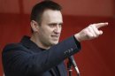 Russian opposition leader and anti-corruption blogger Alexei Navalny addresses supporters during a protest rally in Moscow