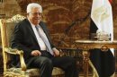 Palestinian President Abbas attends a meeting with Egypt's interim President Mansour in Cairo