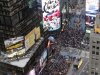 Demonstrators affiliated with the Occupy Wall Street rally in New York's Times Square, Saturday, Oct. 15, 2011. (AP Photo/Mary Altaffer)