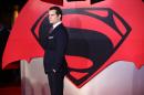 British actor Henry Cavill poses for a photograph after arriving to attend the European Premiere of the film "Batman v Superman: Dawn of Justice", in central London on March 22, 2016