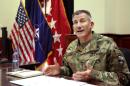 Head of NATO and U.S. forces in Afghanistan, U.S. Army Gen. John W. Nicholson, speaks during an interview with The Associated Press at his office, in Kabul, Afghanistan, Wednesday, July 27, 2016. (AP Photo/Massoud Hossaini)
