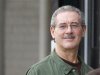 Allen Stanford smiles as he waits to enter the Federal Courthouse where the jury is deliberating in his criminal trial in Houston